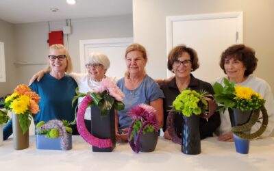 Calusa Garden Club Members Design with Yarn and Make Tillandsia Wreaths – –